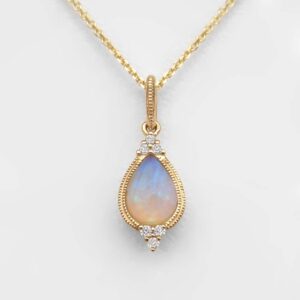 yellow gold opal and diamond pendant
